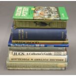 A quantity of various antique reference books.