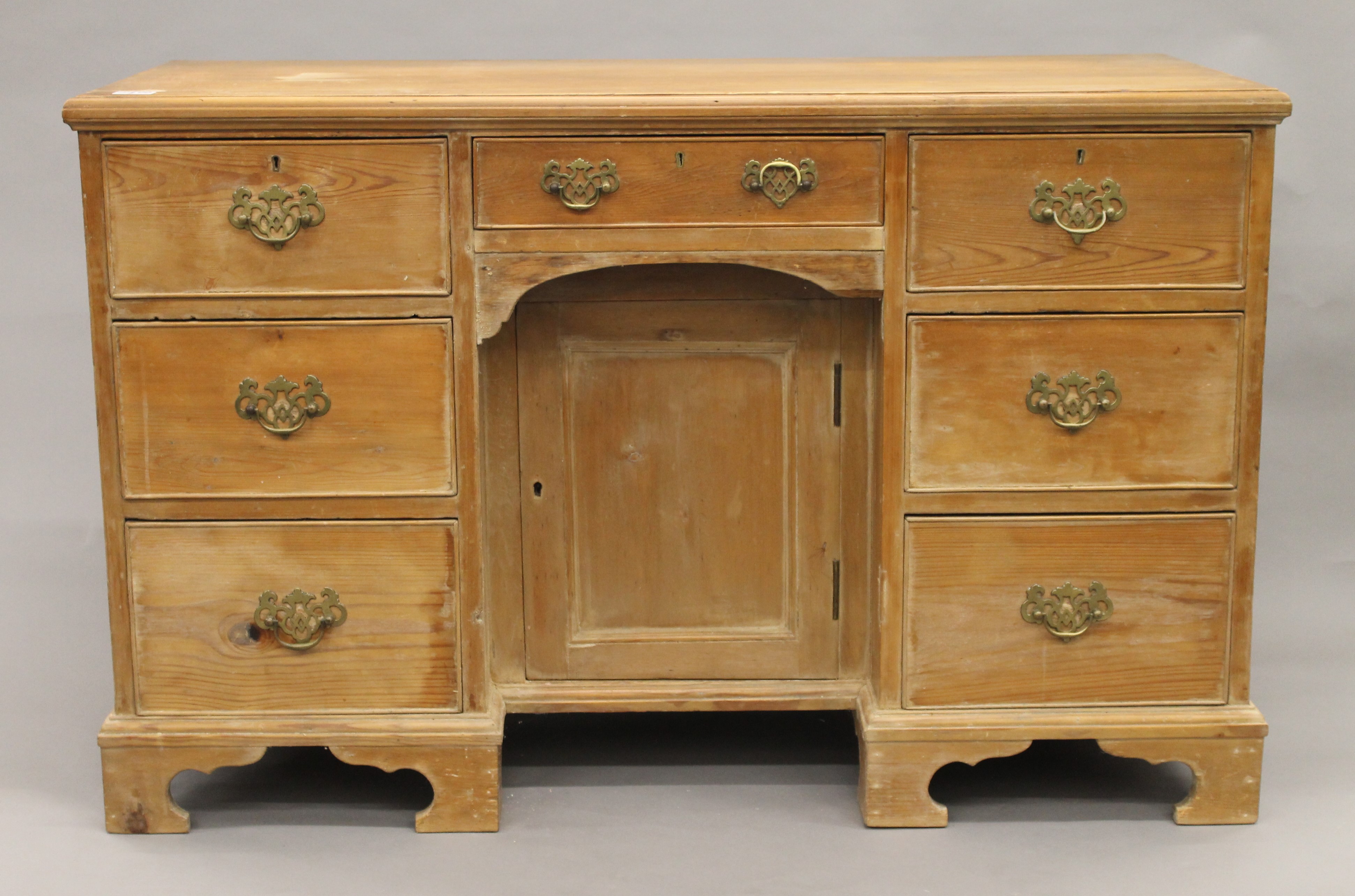 A 19th century pine desk. 116 cm wide.