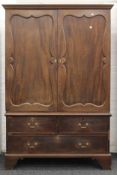 A 19th century mahogany linen press. 130 cm wide x 194 cm high.