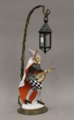 An early 20th century K Himmelstoss-Rosenthal table lamp modelled as Bajazzo.