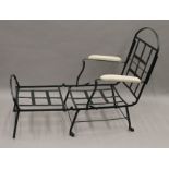 A 19th century wrought iron folding lounger chair. 66 cm wide.