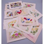 Seventeen World War I embroidered silk postcards including some with note cards.