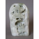 A Chinese carved jade boulder. 16 cm high.