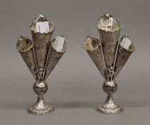 Two silver triple bud vases. 16 cm high. 228.9 grammes.