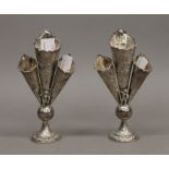 Two silver triple bud vases. 16 cm high. 228.9 grammes.