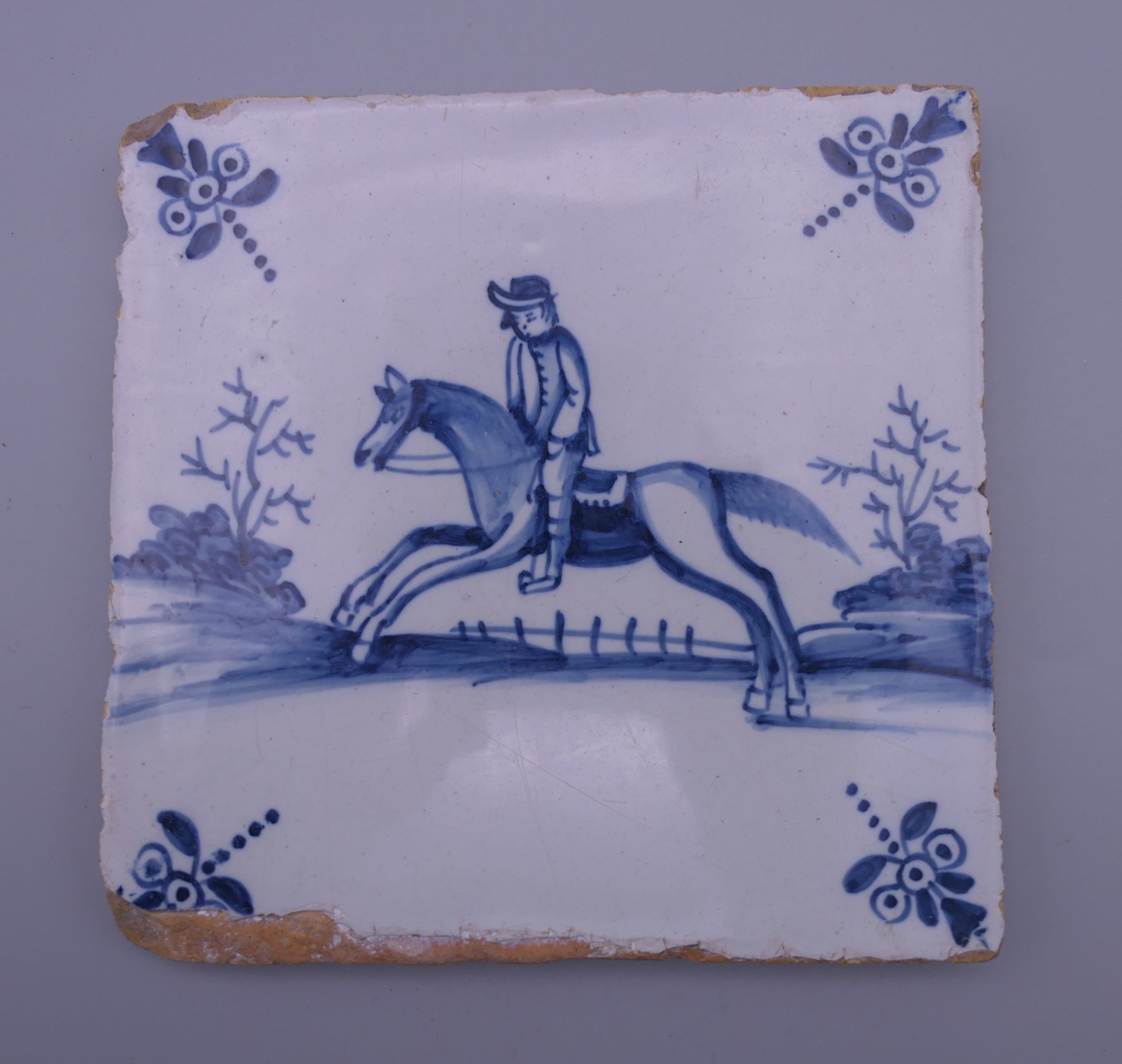 A Delft tile and two 19th century painted plaques. The former 12.5 cm wide. - Image 2 of 13