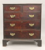 A George III mahogany chest of drawers. 94 cm wide.