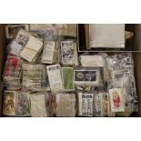 A large box of mainly tea cards and some cigarette cards