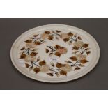 An Indian marble, stone and shell inlay circular dish. 33 cm diameter.