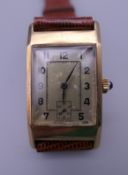 An Art Deco 9 ct gold gentleman's wristwatch. 2.25 cm wide.