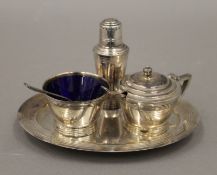 A Mappin and Webb Art Deco silver plated cruet set, in Mappin and Webb box. The pepper 8 cm high.