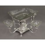 A silver plated and cut glass centrepiece. 56 cm wide.