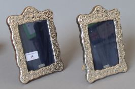 A pair of silver photograph frames. 14.5 x 19.5 cm.