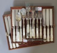 A quantity of mother-of-pearl handled silver plated cutlery.