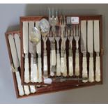 A quantity of mother-of-pearl handled silver plated cutlery.