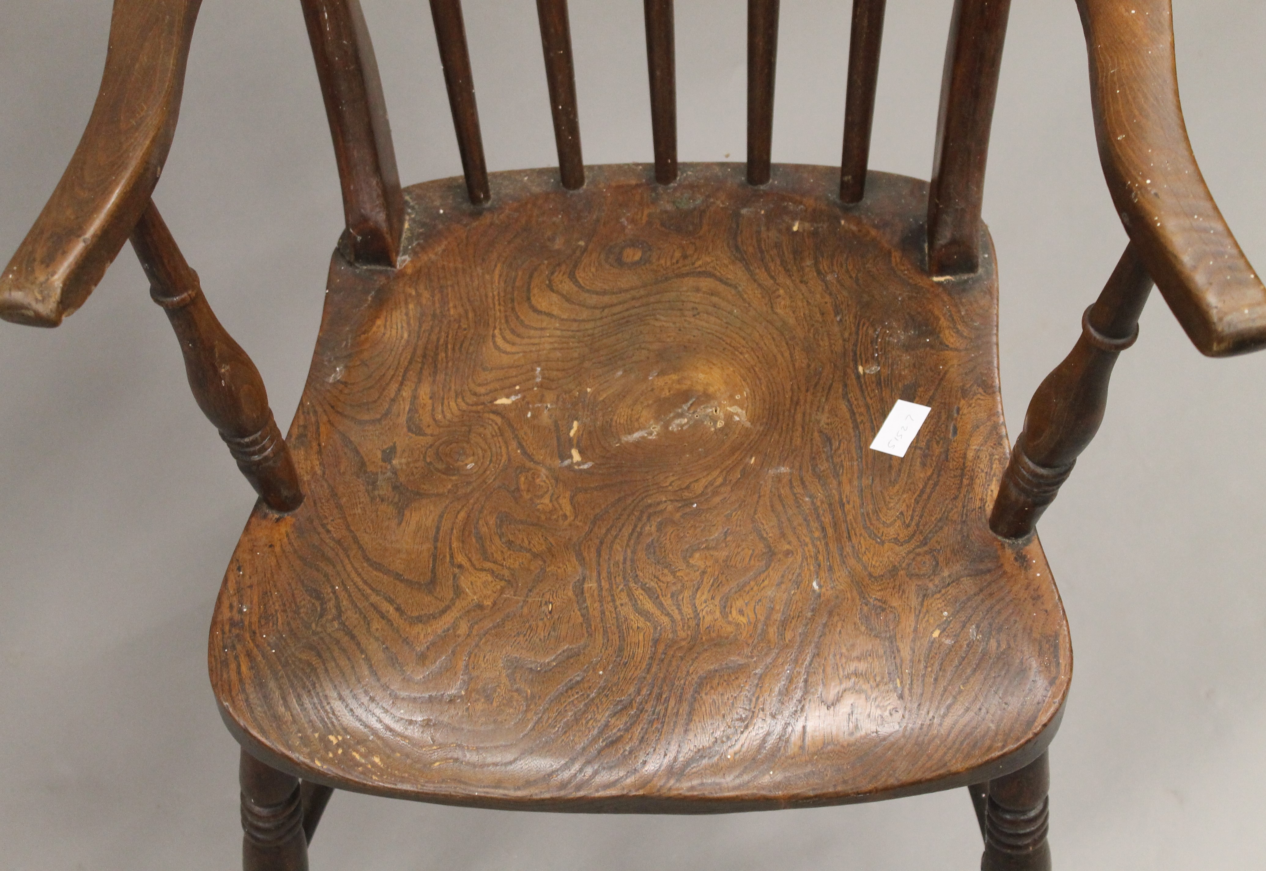 A Victorian elm seated stick back armchair and another. - Image 10 of 11