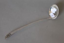 A Georgian bright cut silver ladle. 36 cm long. 158.2 grammes.
