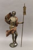 An antique wooden figural carving. 69.5 cm high overall.