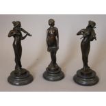 A set of three Art Nouveau style bronze musicians.