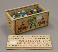 A box of vintage marbles.