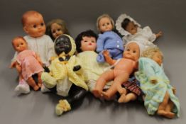 A quantity of vintage dolls.