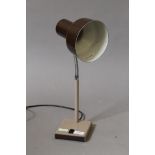 A brown angle poise lamp, model number 99.