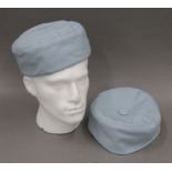 Two pale blue Lock & Co Hatters of St James's Street, cotton and quilt lined smoking caps.