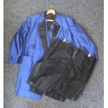 An electric blue jacket, matching waistcoat and two pairs of black evening trousers.