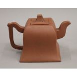 A Chinese Yixing teapot. 10.5 cm high.