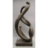 A large abstract patinated bronze sculpture. 89 cm high.