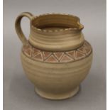 Carter, Stabler and Adams (Poole) unglazed slipware jug. 12.5 cm high.