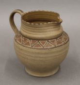 Carter, Stabler and Adams (Poole) unglazed slipware jug. 12.5 cm high.