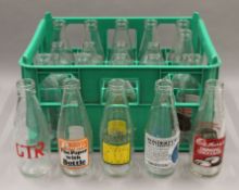 A collection of vintage milk bottles.