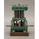 A marine model steam engine. 18 cm high.