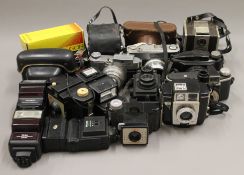 A quantity of various camera equipment.
