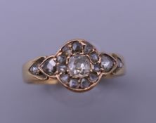 A Victorian 18 ct gold rose cut diamond ring. Ring size N. 2.7 grammes total weight.