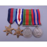 A set of four WWII medals.