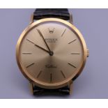 A Rolex Cellini 18 K gold cased gentleman's wristwatch. 3.25 cm wide.