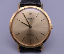 A Rolex Cellini 18 K gold cased gentleman's wristwatch. 3.25 cm wide.
