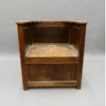 An early 20th century box settle. 63.5 cm wide.