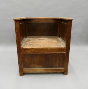 An early 20th century box settle. 63.5 cm wide.