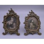 A pair of small brass frames. Each 10.5 cm high.