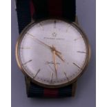 A gentleman's 9 ct gold cased Eternamatic wristwatch. 3.25 cm wide.