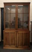 A modern mahogany bookcase cabinet. 124 cm wide x 216.5 cm high.