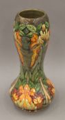 A 1997 Moorcroft Flame of the Forest pattern vase by Philip Gibson, boxed. 28 cm high.