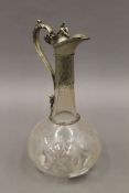 A silver plate mounted cut glass claret jug. 27 cm high.