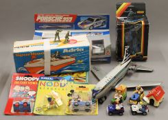 A quantity of various toys and games.