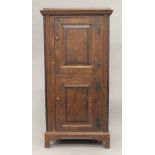 A Georgian oak two door side cupboard. 70.5 cm wide x 145 cm high.