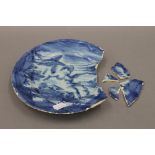 A 17th/18th century Savona Maiolica blue and white dish. 22.5 cm diameter.