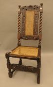 A 17th century style caned side chair. 49 cm wide.